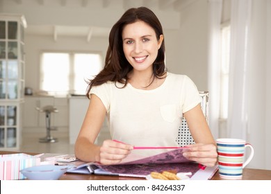 Woman Scrapbooking