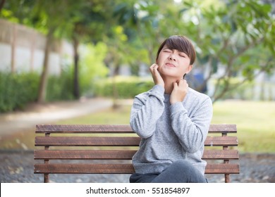 Woman Scratching Her Face