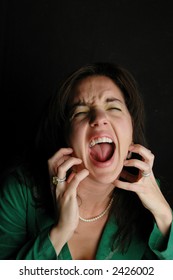 woman screaming in dark out of fear