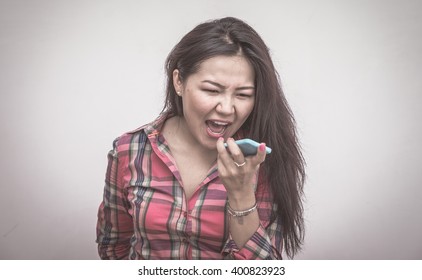 Woman Screaming In The Smart Phone.dramatic Portrait Style Image