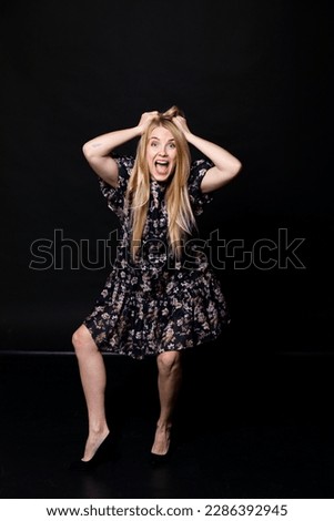 Similar – Young stressed woman wearing rabbit ears