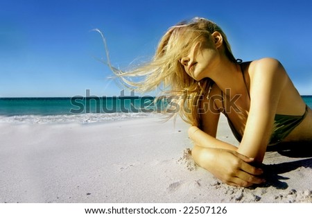 Similar – Young, slim woman on the beach of the Baltic Sea in summer wind