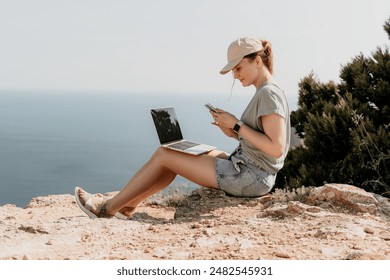 Woman sea laptop. Business woman, freelancer with laptop working over blue sea beach. Happy smiling girl relieves stress from work. Freelance, remote work on vacation, digital nomad, travel concept - Powered by Shutterstock