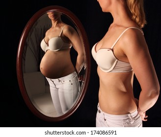 Woman seeing herself pregnant in a mirror
