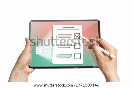 Woman selects the right answer in questionnaire on her digital tablet. Concept of online testing, questionnaires, voting. Isolated on white