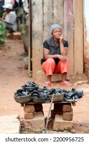 Woman Selling Charcoal In The Street.  Madagascar.  01-30-20