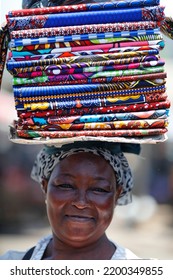 Woman  Selling  Imported Chinese Wax Print Fabric For Traditional African Dress.  Lome. Togo.  05-30-19