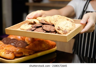 A Woman Sells Sweets, Cookies And A Bakery In A Coffee Shop. Small Business SME