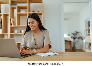 Woman sending an email to someone. - Powered by Shutterstock