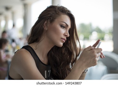 Woman Sending A Text Message 