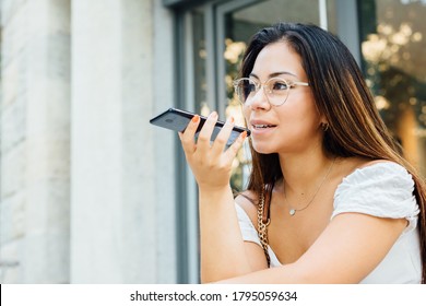 Woman Sends A Voice Message Using Her Smartphone