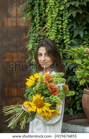 Similar – Young woman with closed eyes laughing over nature background