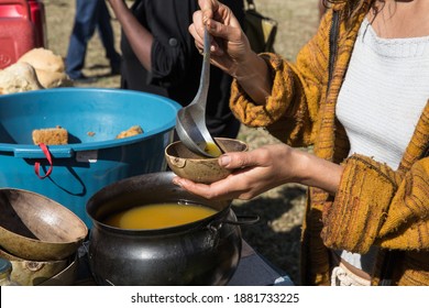 Woman Serving Soup Made By Ingredients In Family Agriculture Farm O The State Of Minas Gerais, Brazil.