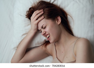 A Woman With A Severe Headache