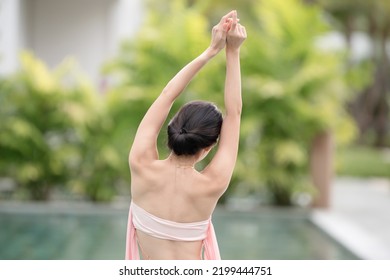 Woman In Sexy Bikini At Poolside Outdoor.