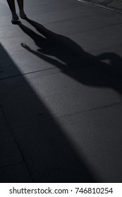 Woman Shadow On The Street