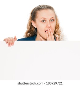 woman in shock - portrait of a beautiful businesswoman holding a blank billboard - Powered by Shutterstock