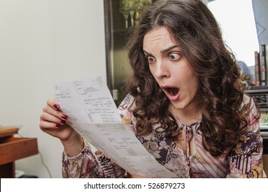 Woman Shocked And Surprised With Her Electricity Bills