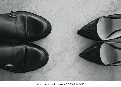 Woman Shoes Against Men Shoes, Man Vs Woman Concept, Feminist And Mens World, Black And White Style