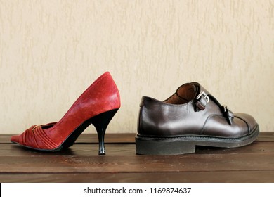 Woman Shoes Against Men Shoes, Man Vs Woman Concept, Feminist And Mens World.