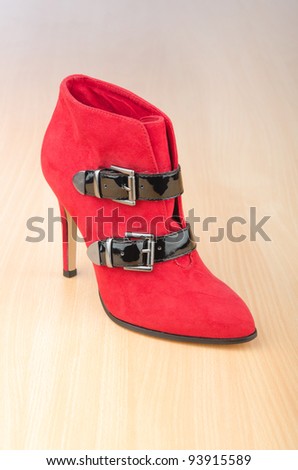 Woman shoes in the fashion concept