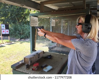 Woman At A Shooting Range