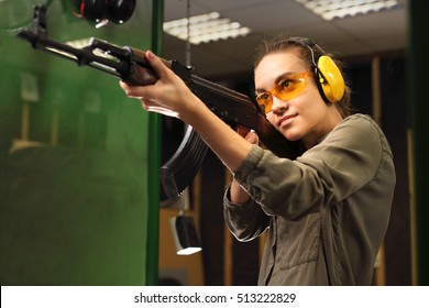 The Woman At The Shooting Range Shot From A Rifle.