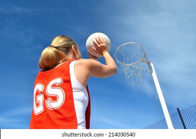 Woman Shoots A Netball Goal