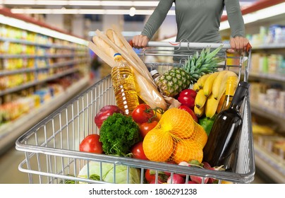 Woman Shopper Panic Buying Products In The Supermarket, Virus Pandemic Quarantine.