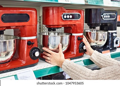 Woman Shopper Selects Electric Food Processor