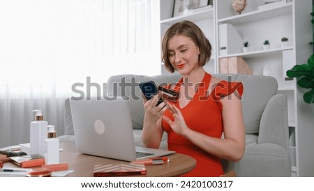 Woman shopping or pay for beauty product online on internet marketplace browsing for sale cosmetic as modern lifestyle and credit card for online payment from wallet by prim cyber security software Stock foto © 