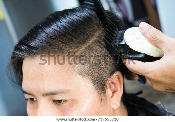 cut hair with clippers woman