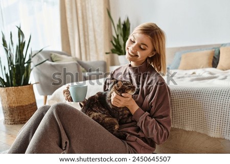 Image, Stock Photo Short-haired woman warms her hands with her breath in the autumn in the park