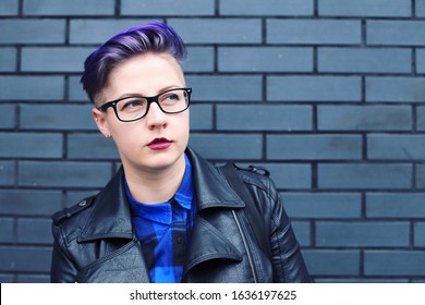 Woman with Short Hair and Wearing Leather Jacket. - Powered by Shutterstock