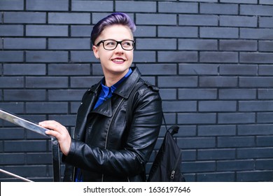 Woman with Short Hair and Wearing Leather Jacket. - Powered by Shutterstock