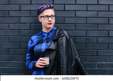 Woman with Short Hair and Wearing Leather Jacket. - Powered by Shutterstock