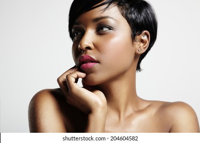 woman with a short haircut and black skin
