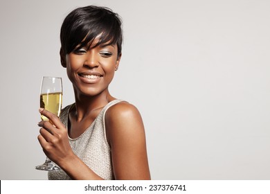 Woman With A Short Haircut Holding Champagne