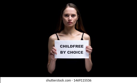 Woman Showing Childfree By Choice Sign, Voluntary Refusal From Children, Freedom