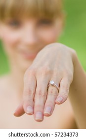 A Woman Showing An Engagement Ring