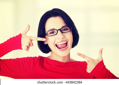 Woman Showing Her Perfect Straight White Teeth.