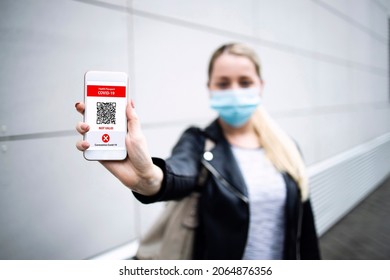 Woman Showing Not Valid Digital Health Passport On Her Phone Not Allowing To Travel Or Enter Commercial Buildings.