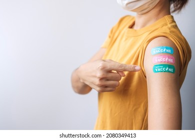 Woman Showing Plaster After Receiving Covid 19 Vaccine. Vaccination, Herd Immunity, Side Effect, Booster Dose, Vaccine Passport And Coronavirus Pandemic