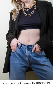 Woman Showing Stomach After Lose Kilos. Woman On White Background