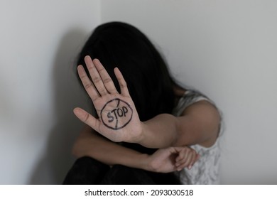 Woman Showing 'STOP' Sign On Hand To Empower, Awareness Violence, Molestation, Women Safety, Crime Against Women Rape, Sexual Abuse, Harassment At Work, Human Trafficking, Dowry, Forced Marriage, Sex.