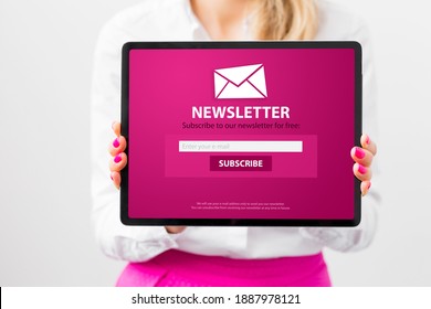 Woman Showing Tablet With Newsletter Signup Page