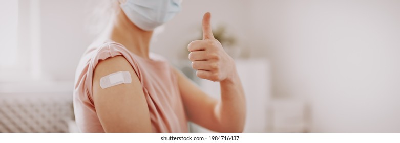 Woman Showing Thumb Up After Inoculation Against Covid 19.