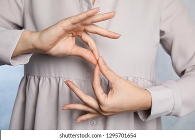 Woman showing word interpreter, closeup. Sign language