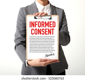 Woman Showing A Written Informed Consent