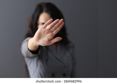 Woman Shows Negative Gesture With Her Hand. Quitting Bad Habits Concept